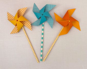 Yellow, teal, orange and yellow pinwheels | First trip around the sun | Sunshine birthday party | Beach party pinwheels