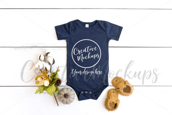 Bella And Canvas Navy Blue Bodysuit Mockup On Wood