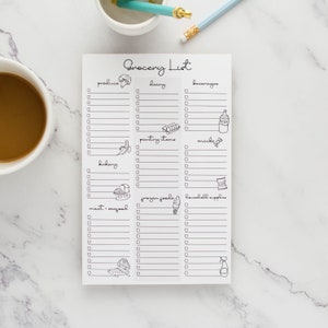 May include: A white grocery list notepad with black checkboxes and illustrations of various food items. The categories include produce, dairy, beverages, pantry items, bakery, frozen foods, meat and seafood, and household supplies.