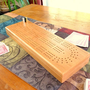 Cherry Cribbage board for 3 players, with storage for pegs and cards