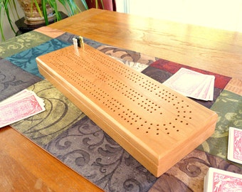 Cherry Cribbage board with 3 tracks, with storage for pegs and cards