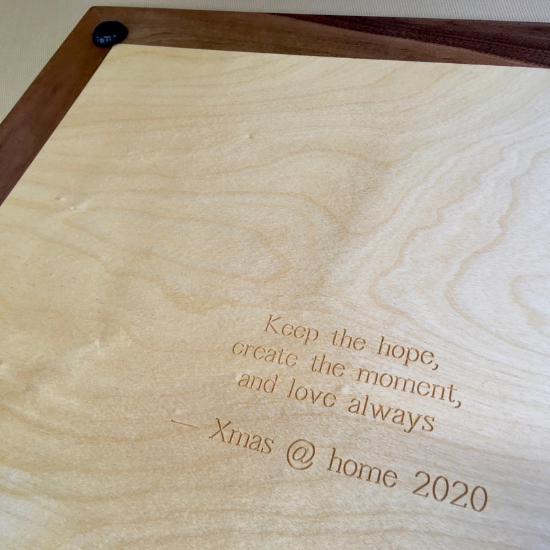 Close up of custom engraved text on back of chess board reads: Keep the hope, create the moment, and love always // Xmas @ home 2020