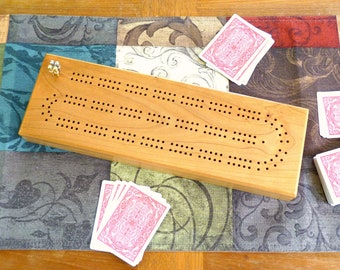 Cherry Cribbage board with 2 tracks and storage for pegs and cards