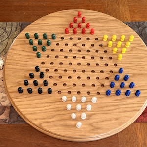 Chinese checkers board in solid walnut, oak, or cherry with wooden pegs