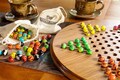 Wooden Chinese checkers board (16.5 inches) with fancy marbles, in solid cherry or walnut | Gifts