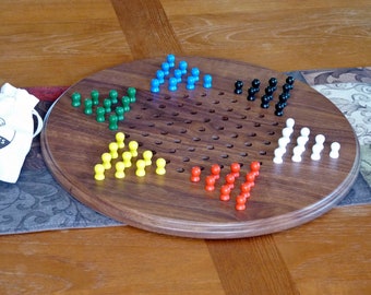 Chinese checkers board (16.5 inches) in solid walnut or cherry with painted wooden pegs