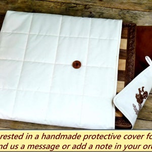 Handmade protective cover for chess board available separately.