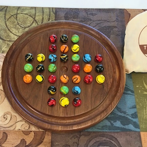 Walnut solitaire board game (9 inch board) with fancy glass marbles | custom engraving available