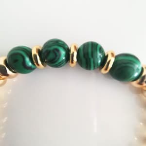 Green Malachite Round Beads Goldstring Elastic  Bracelet, surrounded by 18K Gold Plated Beads