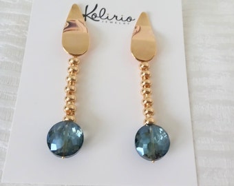 Blue Goldstring Earrings, attached to 18K Gold Plated Goldstring, hanging from 18K Gold Plated Polished Wavy Teardrop Earstud Earrings