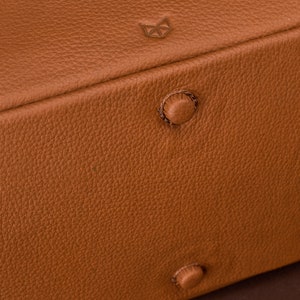 Leather feet. Designer Duffle Bag Tan by Capra Leather