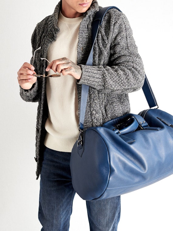 Blue leather duffle bag discount
