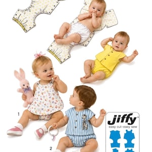 May include: Simplicity pattern S9338 for a newborn layette, 1-3 months. Includes instructions for a floral print top with matching bloomers, a yellow top with bloomers, and a blue and white striped top with bloomers featuring a giraffe graphic.