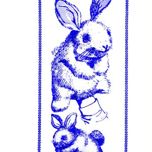 May include: A blue and white illustration of a rabbit puppet toy. The illustration is framed with a blue border. The text "Design 463 RABBIT PUPPET TOY" is printed in blue at the top of the image.