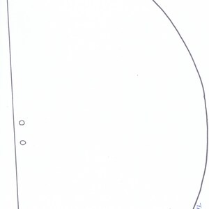 May include: A white paper template for a half circle with instructions to tape 3 to 4 here.