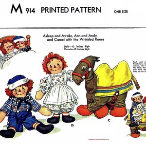 Puede incluir: Un patrón impreso para muñecos y un camello, etiquetado como M 914. El patrón incluye instrucciones para muñecos de 33 cm de altura y un camello de 30,5 cm de altura, con ilustraciones de los muñecos y el camello terminados en varias poses.