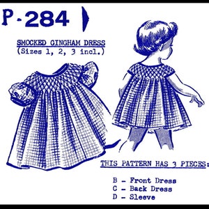 Peut inclure: Un patron de couture vintage pour une robe en vichy smockée, tailles 1, 2 et 3. Le patron comprend des instructions pour une robe avant, une robe arrière et une manche. Le patron est imprimé sur du papier blanc avec du texte et des illustrations bleus.