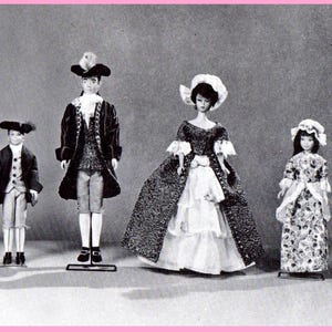 May include: Four dolls dressed in vintage clothing. The dolls are wearing a variety of styles, including a colonial-era outfit, a long dress with a lace trim, and a simple dress with a floral pattern. The dolls are standing on a white background.