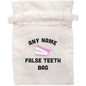 May include: A white drawstring bag featuring the text "ANY NAME" above a pink illustration of false teeth. Below the teeth is the text "FALSE TEETH BAG" in black. The bag is made of a soft, opaque material.