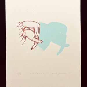 May include: A hand drawn illustration of a hand making the sign for an elephant. The hand is labeled "right" and "left". The shadow of the hand is an elephant silhouette in blue. The print is numbered 14/50 and signed "Keith Janson".