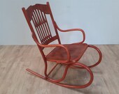 A bentwood rocking chair designed by Gustav Siegel