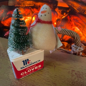 Vintage Spice Tins with a Homemade Snowman and Bottle Brush Tree image 4