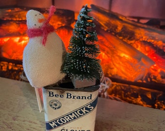 Vintage Spice Tins with a Homemade Snowman and Bottle Brush Tree