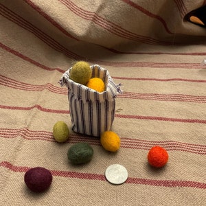 Primitive Colors 100% Felted Wool Eggs, 3/4 or 1 with krinkled kraft grasses in a ticking basket image 4