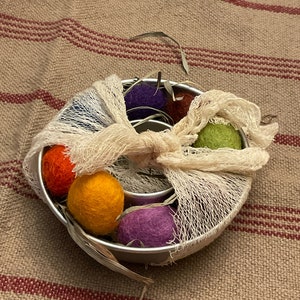 Primitive Colors 100% Felted Wool Eggs, 3/4 or 1 with krinkled kraft grasses in a ticking basket Round Mold