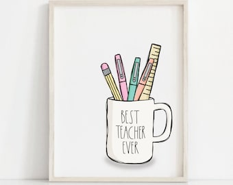 May include: A white mug with the text "BEST TEACHER EVER" in black lettering. The mug is filled with a yellow pencil, a pink pen, a light blue pen, an orange pen, and a yellow ruler.