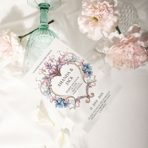 May include: Wedding invitation with a floral design in shades of pink, blue, and gold. The invitation reads "Amanda & Jack" and includes the date "12 June 202X" and the location "The Reagan Library, Simi Valley, California".