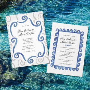 May include: Two wedding invitation cards with blue and gray watercolor designs. The cards feature elegant calligraphy and decorative borders. The background is a vibrant blue water scene.