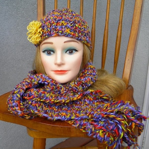 Rainbow crochet scarf beanie hat soft varigated yellow purple blue red orange brown yarn flower accent