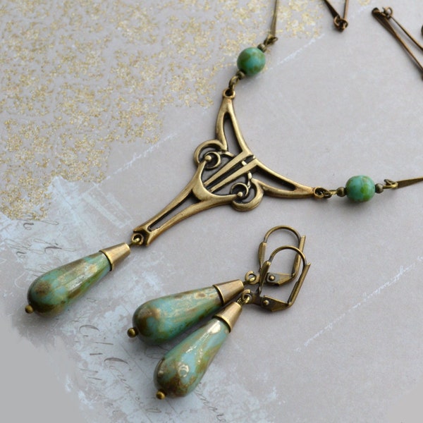 Ensemble collier et boucles d'oreilles Art déco en verre tchèque chiné turquoise et or