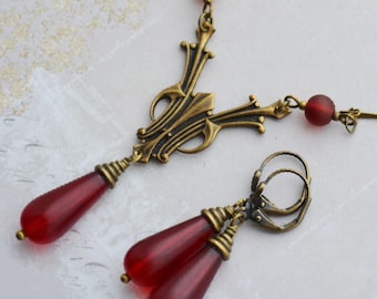 Art-deco set rode glazen druppelketting en oorbellen, antiek messing