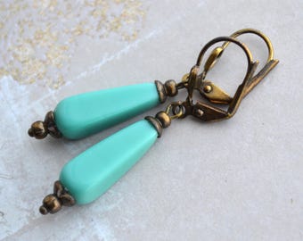 Art deco, turkooisblauwe glazen druppel, antieke koperen oorbellen
