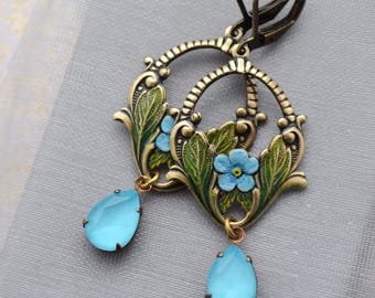Aquablauwe art nouveau-oorbellen, bloemen, glasdruppels