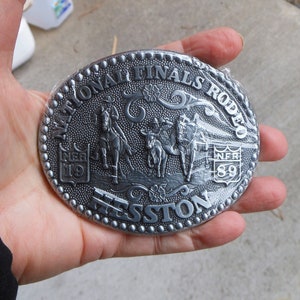 1989 Hesston Rodeo Belt Buckle National Finals Rodeo Buckle - NOS Still in Wrapper With Paperwork - Shows Steer Wrestling