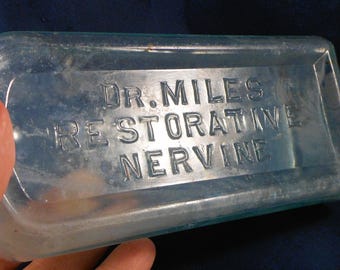 Dr. Miles Restorative Nervine Bottle - Aqua Colored Embossed Glass 8 3/8" Tall - From Early 1900's - Very Collectible