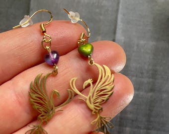 Mythical fire bird earrings Gold color Phoenix dangles with crystal purple/green glass heart 18K Gold plated French hooks Spirit animal gift