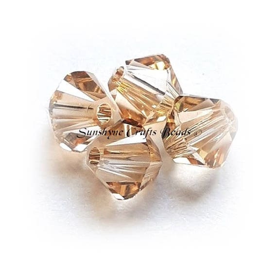 3mm Crystal Golden Shadow Genuine Swarovski crystal 5328 XILION Bicone Beads
