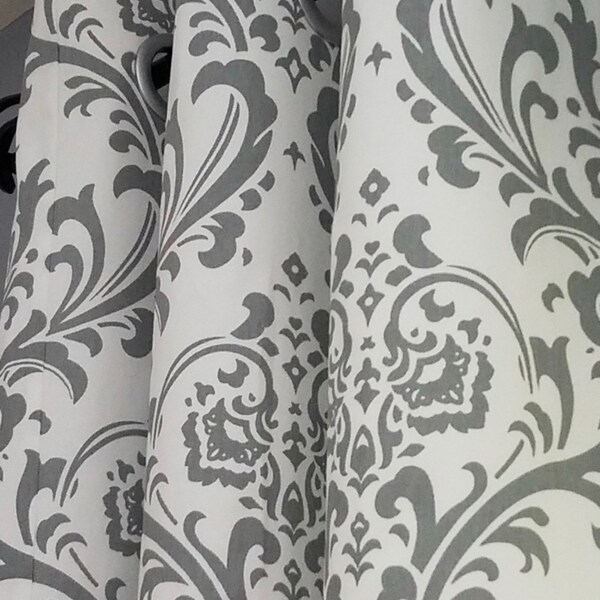 Gray and white grommet curtain panels. Lined medium white.  Damask gray curtains. Custom orders available-any width or length