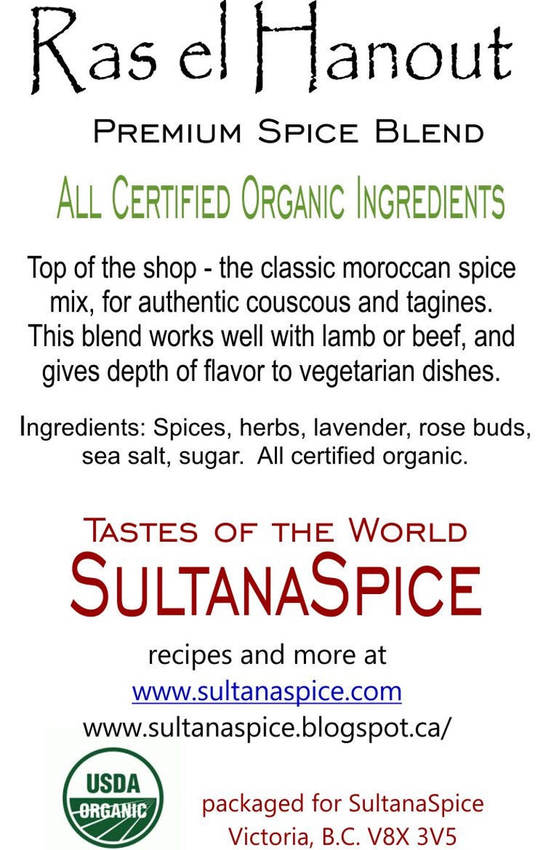 May include: A white product label for Ras el Hanout Premium Spice Blend. Text includes: All Certified Organic Ingredients, ingredients list, Tastes of the World SultanaSpice, website URLs, a USDA Organic logo, and location details for Victoria, B.C.