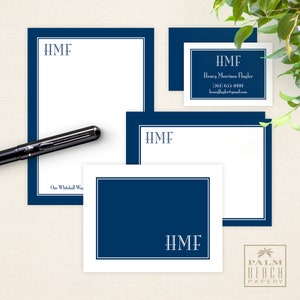 May include: A set of navy blue and white stationery with the monogram "HMF" and the text "One Whitehall Way" on the letterhead. The business card has the monogram "HMF", the name "Henry Morrison Flagler", a phone number, and an email address. The stationery is from "Palm Beach Papery".