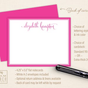 May include: A white flat notecard with a pink border and the text "elizabeth hampton" in pink script. The back of the card has details about the cardstock, lettering style, and envelope options. The card is 4.25 inches by 5.5 inches.