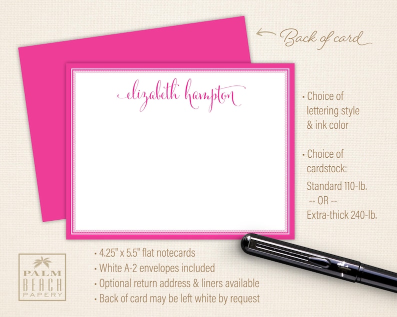 May include: A white flat notecard with a pink border and the text "elizabeth hampton" in pink script. The back of the card has details about the cardstock, lettering style, and envelope options. The card is 4.25 inches by 5.5 inches.