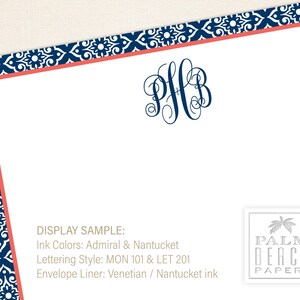 May include: A display sample of personalized stationery with a navy blue and coral border. The monogram is "PFB" in navy blue. The text reads "DISPLAY SAMPLE: Ink Colors: Admiral & Nantucket Lettering Style: MON 101 & LET 201 Envelope Liner: Venetian / Nantucket ink" and "PALM BEACH PAPERY".