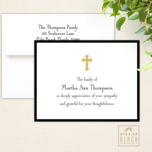 May include: A black and white sympathy card with a gold cross at the top. The text reads "The family of Martha Ann Thompson is deeply appreciative of your sympathy and grateful for your thoughtfulness".