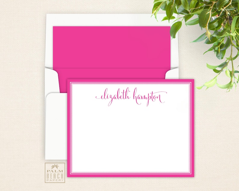 May include: Pink stationery with a white border and the name "elizabeth hampton" written in pink cursive.