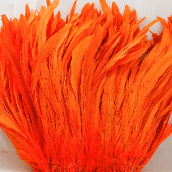 Orange 10" - 12" strung coque rooster tail  feathers 1 pound